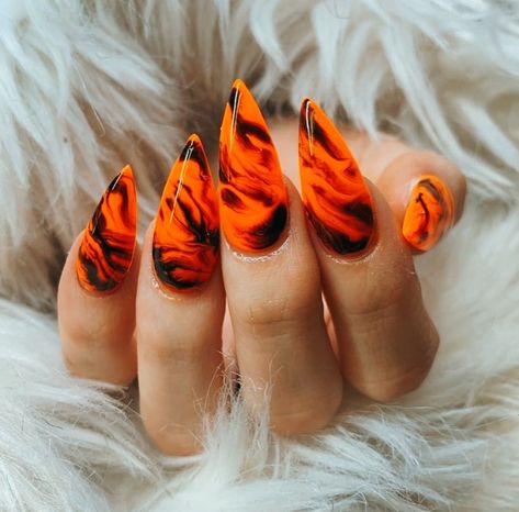 Orange Stilleto Nails Long, Red Nail Designs Stiletto, Halloween Marble Nails, Orange Stiletto Nails Designs, Orange And Black Nails Acrylic, Nails Black And Orange, Red And Orange Nails, Orange Stiletto Nails, Orange Marble Nails