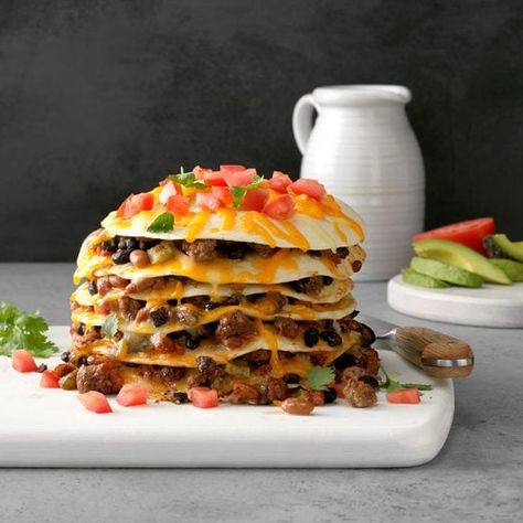 Chuck Wagon Tortilla Stack Recipe: How to Make It Slow Cooker Enchiladas, Enchilada Ingredients, Popular Dinner Recipes, Best Slow Cooker, Enchilada Recipes, Mexican Dishes, Taste Of Home, Ground Beef Recipes, Cooker Recipes