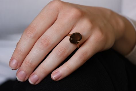 A 9k solid gold smoky quartz ring. Good weight and very extravagant. It weighs 4.22g and is a size 7. It is in near new condition. Price: $450AUD Onyx Engagement Ring, Smoky Quartz Ring, Quartz Ring, Smoky Quartz, Black Diamond, Wedding Inspo, Solid Gold, Onyx, Size 7