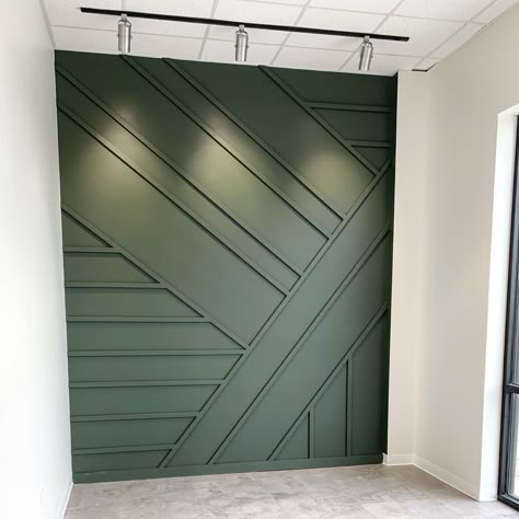 Tv Wall Green Design, Green Accent Wall Salon, Green Accent Wall Hallway, Green Wall With Wood Slats, Dark Green Wall With Wood Slats, Accent Wall Hair Salon, Hair Salon Accent Wall, Dark Green Accent Wall Office, Accent Wall Salon Suite