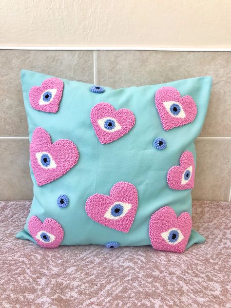 This punch needle evil eye pillow cover is handmade. Embroidery heart pillow case will change the atmosphere of your home. You can complete the decoration of your living room with this mint blue cushion case. You can place the decorative pillow on your sofa or give it to a friend as a housewarming gift. Punch Needle Cushion, Evil Eye Pillow, Punch Needle Pillow, Embroidery Heart, Pillow Cases Diy, Diy Pillow, Embroidery Hearts, Sewing Circles, Needle Embroidery