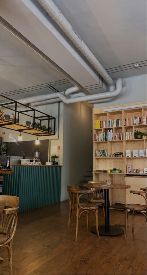 Bookshelf In Coffee Shop, Coffee Shop With Books Aesthetic, Small Book Cafe Interior Design, British Cafe Aesthetic, Book Cafe Ideas Coffee Shop, Library Coffee Shop Interior Design Book Cafe, Coffee Shop Bookshelf, Books And Coffee Shop, Book Coffee Shop Aesthetic