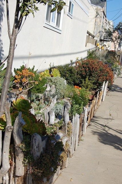 Driftwood Gate, Driftwood Garden, New England Arbors, Coastal Landscaping, Raised Flower Beds, Low Maintenance Landscaping, Garden Pictures, Green Lawn, Flower Bed