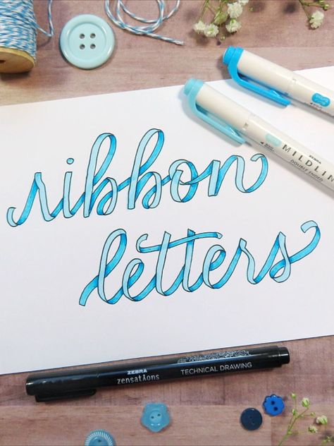 Learn how to create beautiful, three-dimensional calligraphy with this ribbon lettering technique by Zebra Artist Ambassador JoAnne Ovenell. Ribbon Lettering Alphabet, Ribbon Calligraphy Alphabet, Lettering Alphabet Handwritten, Calligraphy Ribbon, Ribbon Calligraphy, Ribbon Lettering, Bullet Journal Hand Lettering, Ribbon Font, How To Draw Ribbon