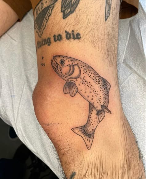 Fly Fishing Tattoo Ideas, Horizontal Tattoo Placement, Fish Knee Tattoo, Fish Tattoo Leg, Bass Fish Tattoo Women, Fish Around Knee Tattoo, Fish Tattoo Thigh, Trout Tattoo Women, Thigh Fish Tattoo