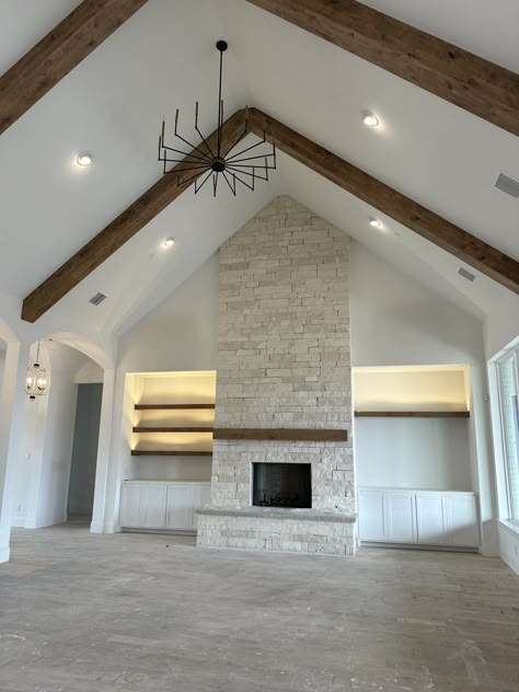 Fireplace Ceiling To Floor, Built Ins Around Fireplace Cathedral Ceiling, Fireplace With Hallways On Both Sides, Fireplace Wall Cathedral Ceiling, Living Room Trusses, Cathedral Ceiling Beams Living Room, Tv Wall Tall Ceilings, Tall Ceiling Living Room Fireplaces, Vaulted Living Room With Beams