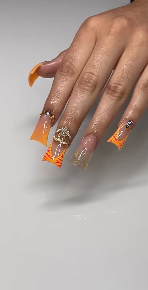 Ginger Nails Acrylic Design, Orange Duck Nails Acrylic, Summer Duck Nails Design, Med Short Acrylic Nails, Summer Duck Nails Acrylic, Orange Junk Nails, Summer Duck Nails, Yellow And Orange Nails Design, Deep Orange Nails