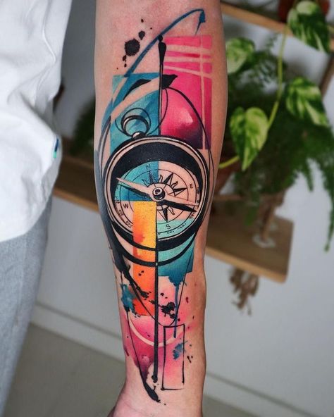 Tattoo work done with EM149 Tattoo work from Spain on Instagram: @pablo_ortiz_tattoo @stigma_tattoo_supply Compass Tattoo Color, Color Compass Tattoo, Colored Tattoo Design For Men, Trendy Tattoos For Women, A Compass Tattoo, Splatter Tattoo, Watercolour Tattoo Men, Trendy Tattoo Ideas, Compass Tattoos