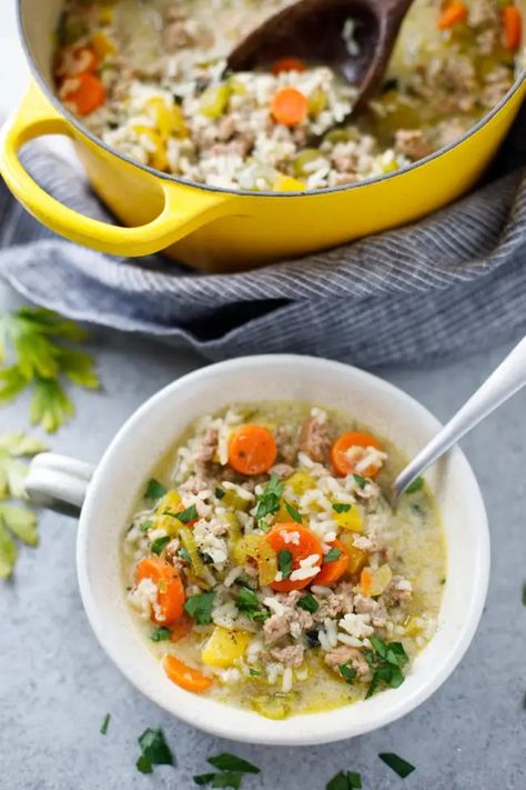 Ground Turkey and Rice Soup Recipe - This hearty veggie, turkey and rice soup is an easy family dinner idea. #groundturkey #turkey #soup #comfortfood Ground Turkey And Rice, Turkey And Rice Soup, Ground Turkey Rice, Veggie Turkey, Recipes Using Ground Turkey, Turkey Rice Soup, Turkey And Rice, Turkey Vegetable Soup, Ground Turkey Soup