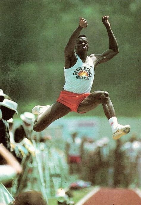 “Jumping Into the Record Books: 8 Long Jump Icons” Jumping Poses, Carl Lewis, Heptathlon, Field Athletes, Sporting Legends, Long Jumpers, Sports Website, Sports Personality, Long Jump