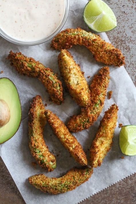 Crispy baked avocado fries coated with crispy panko breadcrumbs with a lime dipping sauce. So fast and easy to make in the oven or air fryer! Avocado Fries Recipe, Lime Dipping Sauce, Healthy Summer Snacks, Avocado Fries, Baked Avocado, Slim Fast, Summer Snacks, Skinny Taste Recipes, Air Fryer Recipes Healthy