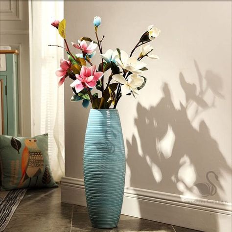 About this item This flower vases home decor is idle for your corners where you want to decorate your flowers as its long in height and oval in shape. This flower vase big size corner 2 Ft is idle for putting both small and long flower sticks which makes your space even more beautiful THESE big flower vases home decor adds a beautiful feel to your living room by adding a luxurious look to your space. Big Flower Vase, Vase Big, Tall Floor Vase, Tall Flower Vase, Long Vases, Sitting Room Decor, Long Flowers, Tall Vases, Big Flowers