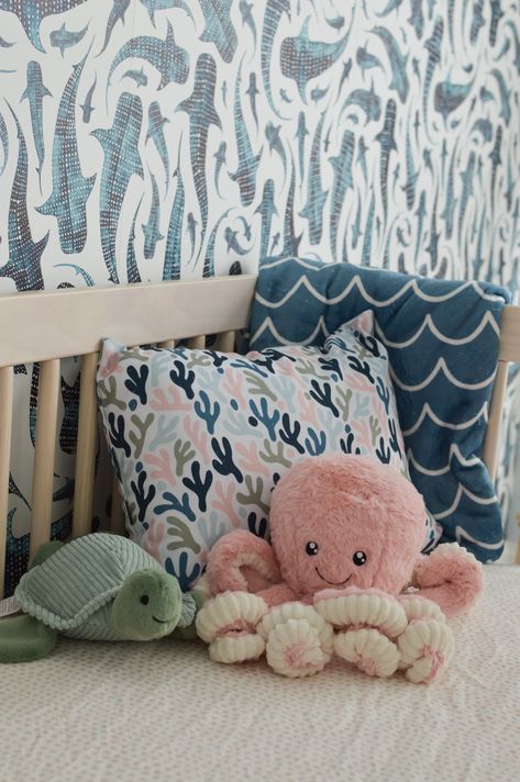 Fun and playful with an elevated feel, this coastal inspired "Under the Sea" nursery is full of patterns and prints that come together for the perfect little girl's nursery! Featuring products from @spoonflower @society6 @babyletto and @potterybarnkids Neutral Nursery Theme Ideas, Nursery Themes Under The Sea, Under The Sea Neutral Nursery, Boho Under The Sea Nursery, Aquatic Themed Nursery, Water Theme Nursery, Girl Under The Sea Nursery, Deep Sea Nursery, Nursery Ideas Under The Sea