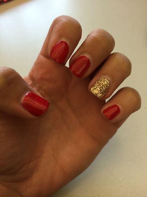 Red and gold gel nails Red And Gold Nails Short Gel, Christmas Nail Red And Gold, Red And Gold Dip Nails, Red And Gold Short Nails, Red And Gold Gel Nails, Red With Gold Nails, Red And Gold Nails Short, Holiday Nails Dip Powder, Red Nails With Gold Glitter