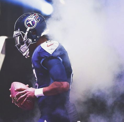 Tennessee Titans QB Marcus Mariota posing in new uniform Tennessee Titans Football, Titans Football, Houston Oilers, Nfl History, Football Uniforms, Tennessee Titans, Nfl Teams, Cheerleading, Tennessee