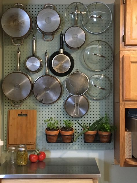 How To Hang Pans In Kitchen, Peg Board Plate Organizer, Ikea Peg Board Kitchen, Cast Iron Pegboard, Pegboard Pots And Pans, Peg Board Cabinet, Peg Board Organization Kitchen, Pegboard For Kitchen, Peg Board Kitchen Wall