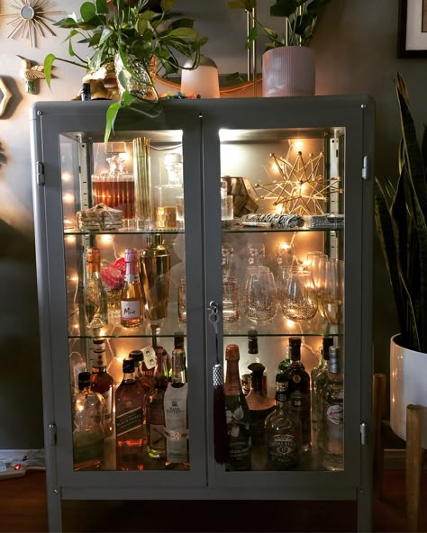 Drinks Cabinet Decor, Drinks Cabinet Ikea, Glass Drinks Cabinet, Home Alcohol Display, Clear Bar Cabinet, Kitchen Liquor Bar Ideas, Narrow Liquor Cabinet, Liquor Cabinet Styling, Glass Liquor Cabinet