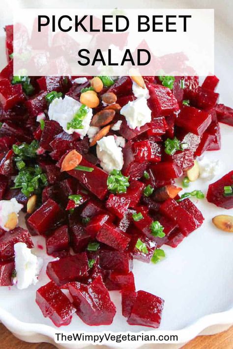 Make this pickled beet salad for a delicious way to eat beets. Pickled beets are topped with feta and pepitas and drizzled with chive oil. Recipes Using Pickled Beets, How To Make Pickled Beets From Canned Beets, Pickled Beets Recipe Dishes, Pickled Beet Recipes, Chive Oil, Red Beets Salad, Pickled Beet Salad, Beet Salad With Feta, How To Boil Beets