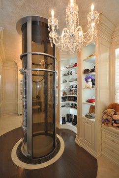 Closet with vacuum elevator. Awesome! -- Luxury home decor, interior design, and decorating ideas -- Home Gym Basement, Dressing Room Closet, Amazing Closets, Walk In Closet Design, Closet Room, Dream Closets, Closet Inspiration, Room Closet, House Elevation