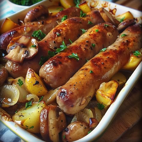 Sausage, Potato, and Mushroom Bake Ingredients: 6 sausages (your choice) 1 kg (2.2 lbs) potatoes, cut into chunks 250 g (8.8 oz) mushrooms, sliced 2 onions, sliced into rings 3 garlic cloves, minced 3 tablespoons olive oil 1 tablespoon Dijon mustard 1 tablespoon honey Salt and pepper, to taste Fresh parsley, chopped (for garnish) Instructions: Preheat the Oven: Preheat your oven to 200°C (400°F). Prepare the Ingredients: Wash and cut the potatoes into chunks. Slice the mushrooms. Slice the ... Italian Sausage Meals, Honey Garlic Sausage, Potato And Mushroom, Mushroom Bake, Mushroom Food, Potatoes Mushrooms, Sausage Potato, Healthy High Protein Meals, Delicious Snacks Recipes