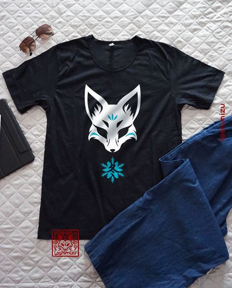 Black tshirt outfit featuring a white design of Japanese Kitsune Fox illustration with light blue details of ice crystals and a snow flake with the Japanese letter “fuyu” written inside, which means Winter. Fox Mask Design, Japanese Kitsune, Fox Graphic, Kitsune Fox, Fox Mask, Fox Lover, Winter Aesthetic, Aesthetic Design, Japanese Culture