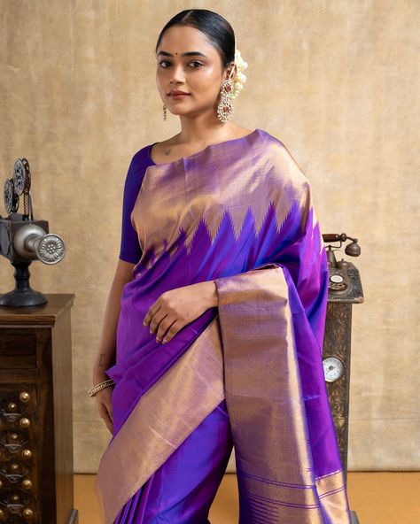 Featuring the classic Kanchipuram silk saree in a captivating aubergine purple hue. This traditional saree showcases its everlasting allure, expertly crafted with an intricate 8Kol temple zari border and adorned with a luxurious zari pallu. Saree code: CL8782105 Indulge in an unparalleled shopping experience by visiting our esteemed store in Alwarpet, Chennai. You can also schedule a video call with us at +91 9962677777. Immerse yourself in a wide array of stunning collections or convenientl... Traditional Saree, Bridal Silk Saree, Kanchipuram Silk Saree, Video Call, Saree Look, Traditional Sarees, Purple Hues, Chennai, Silk Saree