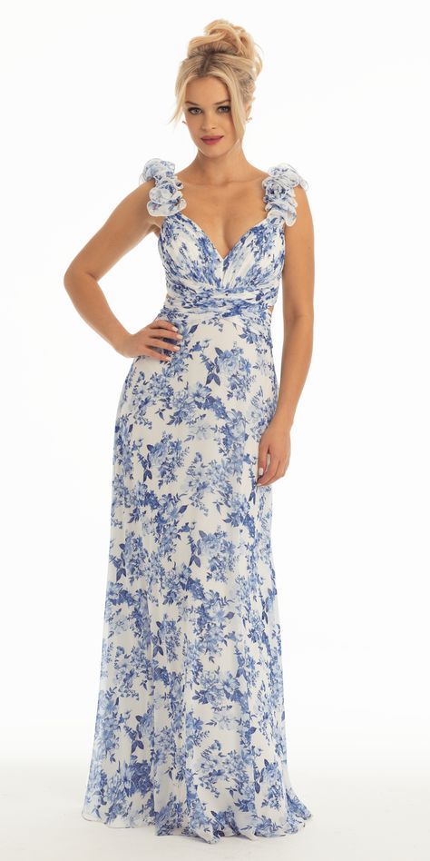 Look poised and picture perfect for your bride's special day in the Floral Print Chiffon Column Dress with Ruffle Shoulders. The features of this bridesmaid dress include a sweetheart neckline flowing from ruffle shoulder straps, fitted ruched bodice with side cut outs chiffon floral print a-line skirt and short lace up back with keyhole. Finish the radiant look with chunky platform sandals and pave drop earrings. Floral Dresses Bridesmaid, Blue Floor Length Dress, Maxi Dress With Sleeves Summer, Chic Blue Floral Dress With Ruffles, Blue And White Floral Bridesmaid Dresses, Sleeveless Blue Floral Chiffon Dress, Blue And White Floral Dress, Blue Floral Bridesmaid Dresses, Feminine Blue Floral Dress With Ruffles