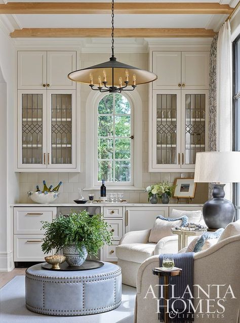 A Soft, Soothing Palette and Exquisite Architectural Details Bring a Buckhead Tudor Revival to Life - Atlanta Homes and Lifestyles Glass Front Cabinet, Tudor Revival, Traditional Dining Room, Keeping Room, Built In Grill, Atlanta Homes, Styling Inspiration, Cozy Fireplace, Southern Home