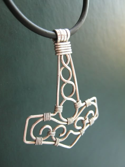 "Mjolnir" handmade pendant out of stering silver wire, my first original "his" pendant. Made this one for myself last summer, still wearing it. Wire Wrapped Viking Jewelry, Thors Hammer Wire Wrap, Viking Wire Jewelry, Viking Jewellery, Mjolnir Pendant, Copper Wire Art, Wire Jewelery, Wire Wrap Jewelry Designs, Chainmail Jewelry