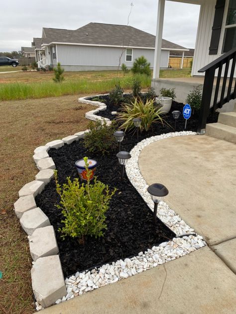 Landscape make over 
White marble stones Outside Mulch Landscaping Ideas, Simple Front Yard Landscaping Ideas With Rocks, Redoing Front Yard Landscaping Ideas, Rocks Around Front Porch, Decorative Landscape Rock, Front Of House Rock Landscape Ideas, Half Mulch Half Rock Landscaping, Easy Cheap Front Yard Landscaping, Front Yard Flower Landscaping Ideas