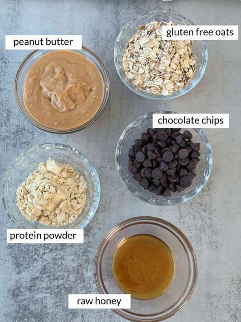 These Peanut Butter Oatmeal Protein Balls are a healthy snack. These no-bake bites are packed with protein, fiber and healthy fats, making them the perfect on-the-go energy boost. Plus, they're bursting with flavor thanks to creamy peanut butter and chocolate chips. With just a few ingredients, you can whip up a batch for a satisfying and customizable anytime snack. #peanutbutteroatmealproteinballs #peanutbutterproteinballs #homemadeproteinballs Protein Oat Bites, Protein Balls Oats, Peanut Butter Oatmeal Protein Bar, Protein Balls Chocolate Chip, 5 Ingredient Protein Balls, Peanut Butter Protein Balls With Protein Powder, Peanut Butter And Oats Protein Balls, Protein Balls With Vanilla Protein, Pb Fit Protein Balls Energy Bites