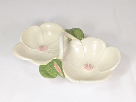 Pretty Vintage Handmade Ceramics, Signed. Floral Double Serving Dish with Handle in White, Pink and Green. Measuring approximately 10" in width, 7" in depth and 2.75" in height to top of the handle. Excellent pre-owned vintage condition. Please see photos for greater detail. Feel welcome to message with any questions. Thank you for stopping by. Bowls Ceramic, Coquette Dishes, Coquette Plate, Pink Jewelry Dish, Pink Ceramic Bowl, Flower Shaped Ceramic Bowl, Pinch Pots, Ceramic Dishes, Ceramics Ideas Pottery