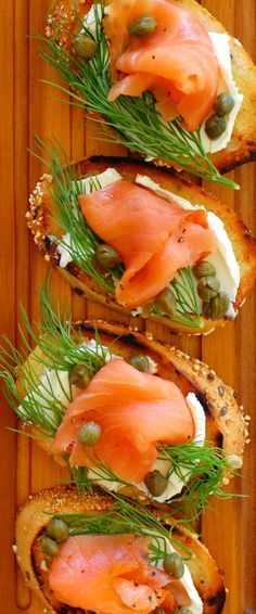 Smoked salmon dill and capers appetizer starts with a toasted baguette, coated with cream cheese, dill weed, capers and smoked salmon. Capers Appetizer, Salmon Dill, Tailgate Treats, Smoked Salmon Appetizer, Salmon Appetizer, Toasted Baguette, Dill Salmon, Seafood Appetizers, Snacks Für Party