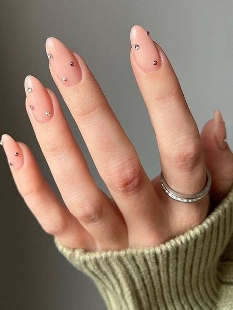 Simple rhinestone accent on nude nails Rhinestone Accent Nail Simple, Gel Rhinestone Nails, Simple Jewl Nails, White Nail With Diamonds, Short Nails Crystals Designs, Jewel Accent Nails, Minimalist Nails With Rhinestones, Minimal Gem Nails, Simple Bejeweled Nails