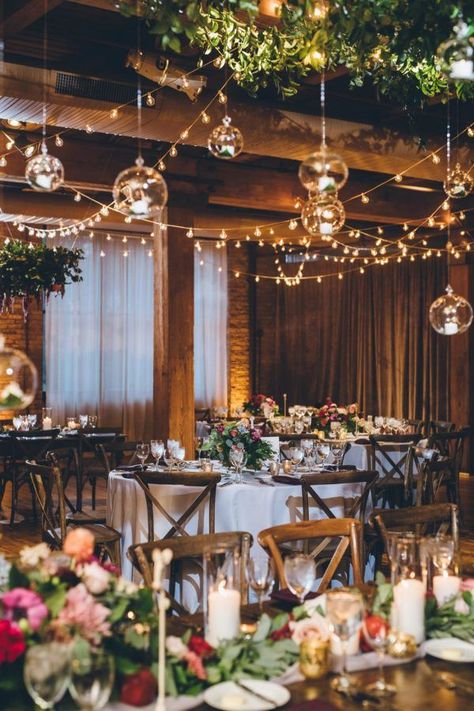 rustic chic wedding reception with open beams and floating terrarium candles Floral Chuppah, Chic Wedding Reception, Candlelit Wedding, Blue Wedding Dress, Indoor Wedding Receptions, Decoration Evenementielle, February Wedding, Rustic Wedding Reception, Loft Wedding