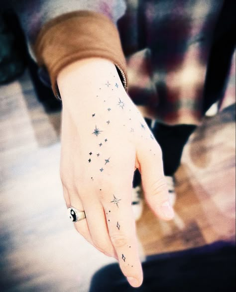 Constellation Bracelet Tattoo, Astronomy Hand Tattoo, Colorful Constellation Tattoo, Perseus Constellation Tattoo, Andromeda Constellation Tattoo, Tattoo Star Constellation, Cup Of Stars Tattoo, Draco Constellation Tattoo, Constellation Finger Tattoo