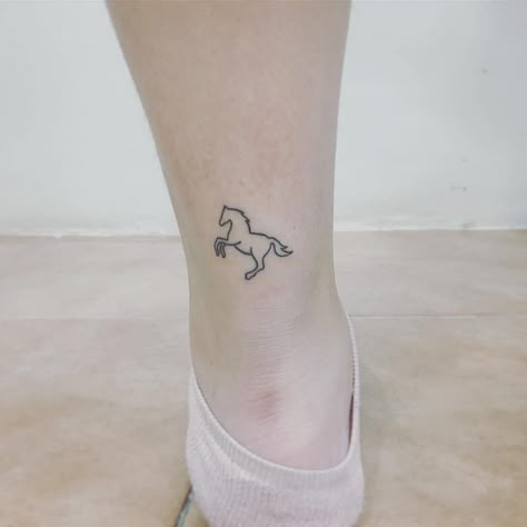 40 Delightful Horse Tattoo Ideas to Make a Style Statement Rabbit Playground, Equine Tattoo, Small Horse Tattoo, Ankle Tattoo Men, Horse Tattoos, Horse Tattoo Design, Cowgirl Tattoos, Shoe Tattoos, Tattoo Placements