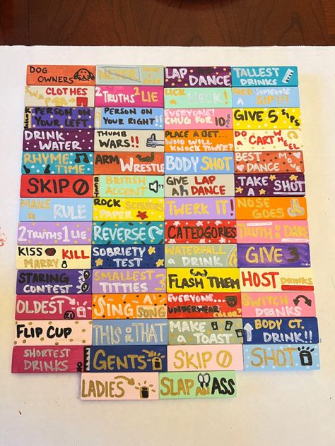 showing jenga pieces with words written on them for drinking. Romantic Jenga Ideas, Jenna Drinking Game, Painted Jenga Blocks Game, Painted Jenga Blocks Drinking Game, Giant Jenga Drinking Game, Paint Jenga Blocks, Diy Drinking Jenga, Fun Jenga Ideas, Spicy Jenga