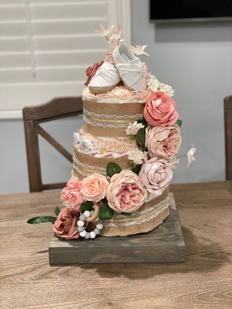 Boho chic, pastels, artificial flowers, baby girl, diaper cake, pink, blush, floral Floral Diaper Cake, Baby In Bloom Diaper Cake, Diaper Cakes For Baby Girl, Flower Diaper Cake Ideas, Boho Diaper Cake Girl, Flower Diaper Cake, Baby Bassinet With Flowers, Blanket Cake, Twin Diaper Cake