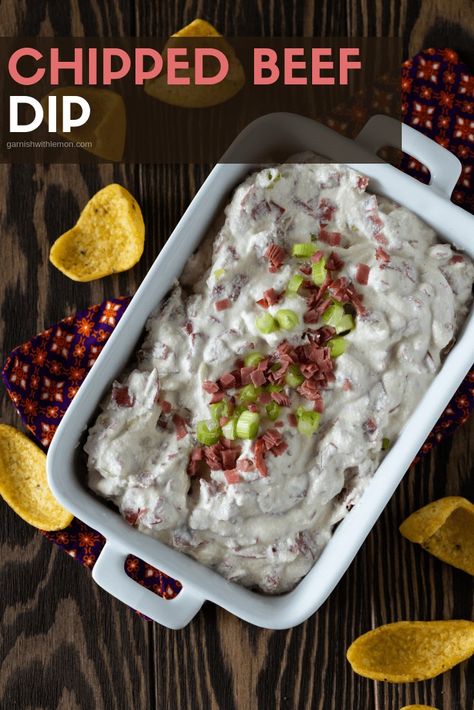 There is a reason this Chipped Beef Dip recipe has been around for years. Classic appetizer recipes never go out of style! #dips #tailgating #appetizers #recipes #partyfood Chipped Beef Dip Bread Bowl, Hot Chip Beef Dip Recipe, Dried Beef Pickle Dip, Chipped Beef Dip Warm, Pickle Dip Recipe With Dried Beef, Hot Chipped Beef Dip Recipes, Hot Beef Dip, Budding Beef Dip, Buddig Beef Dip