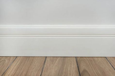 Can Baseboards Be Too Tall? The Sizing Rule to Live By Base Board Trim, Diy Baseboards, Installing Vinyl Plank Flooring, Tall Baseboards, Baseboard Styles, Baseboard Trim, Baseboard Molding, Floor Trim, Trim Work