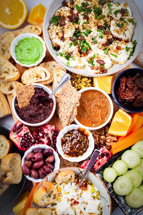 This Italian grazing platter contains simple dips and spreads from the South Italian home cuisine—from sweet to spicy to hearty to umami-flavored. Every small plate is kept simple, so this Italian platter comes together quickly whether you plan to entertain guests or make it a fun dinner. They are all easy to make yet big on flavors. Make the tapas ahead of time for stress-free entertaining. Italian Grazing Board Ideas, Antipasto Ideas, Italian Antipasto Platter, Simple Dips, Grazing Board Ideas, Italian Charcuterie, Italian Platter, Antipasto Platter Italian, Dips And Spreads