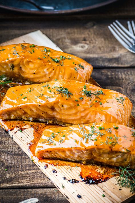 Who doesn’t love the slightly smoky flavor you get from grilled meats and vegetables. One of our favorite recipes is plank-grilled salmon fillets with a flavorful glaze!⁠ ⁠ Our friends at @cooking_with_wine created this recipe for Grilled Salmon with a tasty glaze using our Passion Fruit Purée. The glaze is easy to make and grilling the salmon on a wood plank is even easier! The glaze elevates this salmon for a beautiful presentation for your guests at your dinner event!⁠ Salmon En Salsa, Passion Fruit Sauce, Fruit Glaze, Passionfruit Recipes, Salmon Soy Sauce, Grilled Salmon Recipes, Honey Salmon, Fruit Sauce, Summertime Recipes