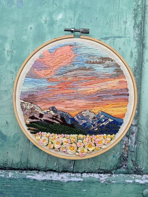 "7\" embroidery on linen. Thread painted mountain scene with a vivid beautiful sunset, dark mountain scape and quirky 3D floral field." Dark Mountains, Painting Pastel, Pastel Sunset, Pretty Embroidery, Landscape Mountain, Thread Painting, Mountain Scene, Hand Embroidery Art, Mountain Paintings