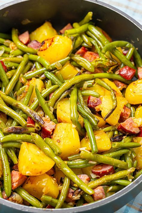 Experience the rich flavors of this Flavorful Kielbasa Skillet with Green Beans and Potatoes. With just 10 minutes of prep, this easy one-pan meal combines savory kielbasa, tender potatoes, and crisp green beans for a comforting, hearty dish. Perfect for a quick, satisfying weeknight dinner that’s packed with flavor and texture. It's a savory delight that's sure to please! Kielbasa Green Beans And Potatoes, Skillet Kielbasa, Sausage Potatoes Green Beans, Easy Kielbasa Recipes, Kielbasa Skillet, Sausage And Green Beans, Green Beans Potatoes, Fresh Green Bean Casserole, Kielbasa And Potatoes