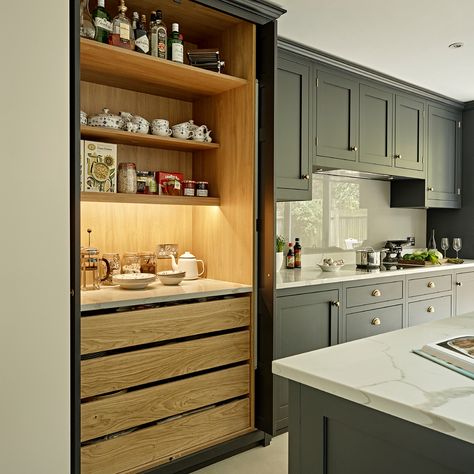 Kitchen cabinets were fitted from floor to ceiling in this Battersea kitchen, to achieve the minimal style desired whilst also eliminating dust traps. Swipe right to see inside this tall cabinet with breakfast station. Gin on cornflakes optional 🍸 . . . #kitchenstyle #practicalkitchen #kitchencabinets #kitchendesign #kitchens #darkkitchens #pantry #shakerkitchen #interiordecor #kitcheninspo #interiorinspo #London #londoninteriors #Battersea #kitchen #shakercabinets Breakfast Cupboard, Upstairs Kitchen, Dapur Rustic, Cupboard Pantry, Tall Kitchen Cabinets, Kitchen Extensions, Kitchen Dark, Shaker Kitchens, Model Dapur