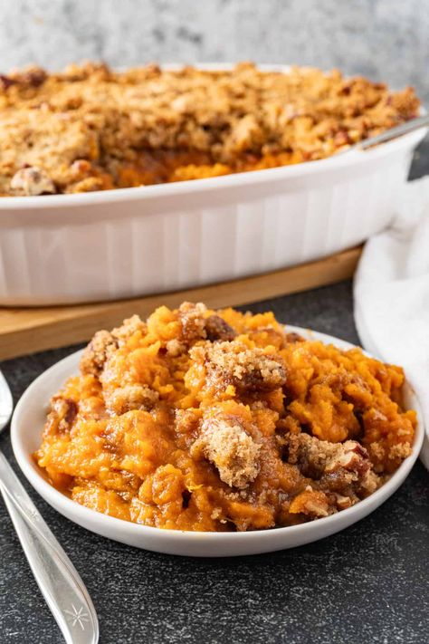 sweet potato souffle on plate Sweet Potato Soufflé, Potato Spuds, Potato Souffle, Best Sweet Potato, Sweet Potato Souffle, Raisin Recipes, Gluten Free Sweet Potato, Souffle Recipes, Candied Sweet Potatoes