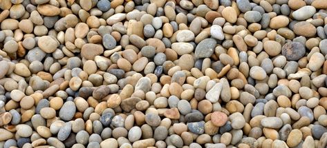 Pea gravel are small, smooth rounded stones that can be used on any walking surface and on driveways. Pebble Driveway Pea Gravel, Cobblestone And Pea Gravel, How To Make A Gravel Driveway, Pea Gravel Driveway, Pea Gravel Calculator, Keeping Pea Gravel In Place, Pea Stone, Driveway Border, Pebble Landscaping