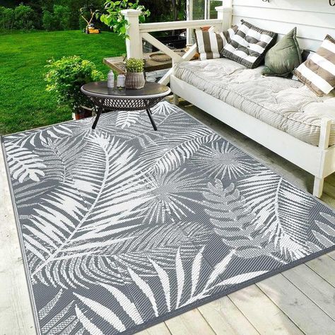 Reversible Outdoor Rugs: This 5x7ft porch rug features a classic palm leaf pattern, bringing a holiday vibe to your outdoor spaces. Made of recycled plastic tubes, it's tightly woven and UV coated for long-lasting colors. Easy to clean and lightweight, it's perfect for patio, camping, beach, and more. With rug stakes included to prevent shifting, it's a versatile choice for any outdoor setting. Elevate your entertainment space with this pet and kid-friendly rug. Camper Backyard, Rug Waterproof, Waterproof Outdoor Rugs, Gray Patio Furniture, Straw Rug, Waterproof Rug, Outdoor Rugs Patio, Outdoor Porch, Deck Garden