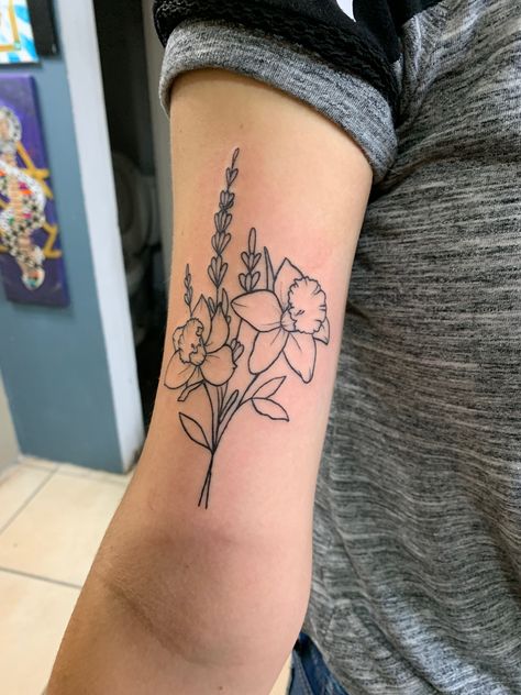 Daffodil tattoo Geometric Daffodil Tattoo Design, Daffodil Tattoo Design For Women, Sunflower Daffodil Tattoo, Daffodil Tattoo Linework, Daffodil And Jonquil Tattoo, Daffodil Arm Tattoo, Daffodil Butterfly Tattoo, Violet And Daffodil Tattoo, Daffodil And Carnation Tattoo